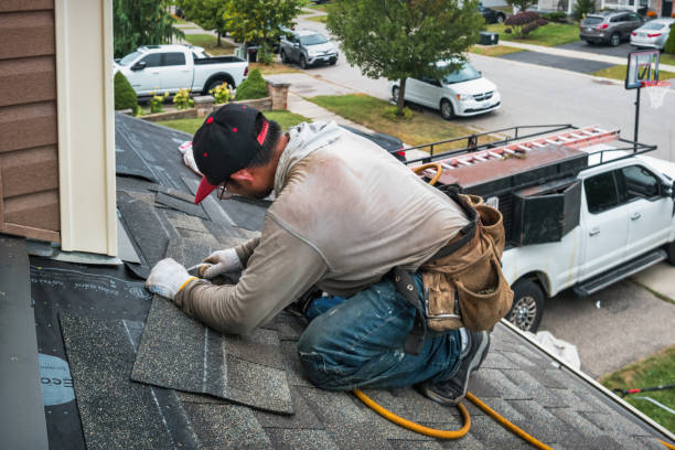 Professional Roofing technician working in Somerset, TX